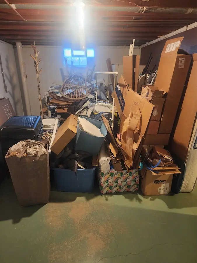 Roll-off dumpster container at job site for 2 Yard Dumpster Rental in Bellefontaine